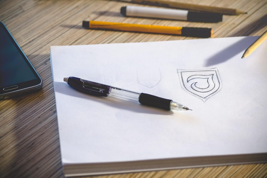 desk, workspace, pencil, paper, logo, sketch, work, office, office desk, workplace, table, document, notebook, drawing, designing, pens, white paper, logo, logo, logo, logo, logo